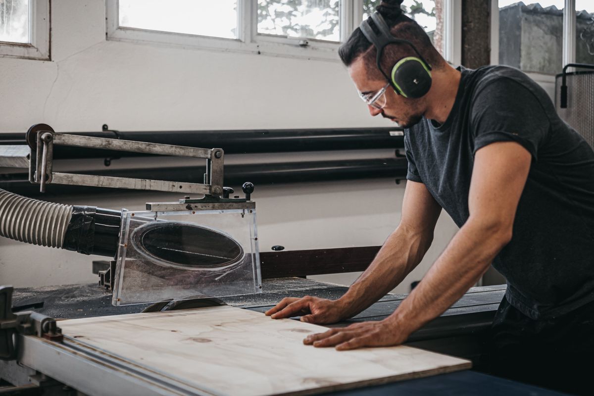 Sam using a table saw